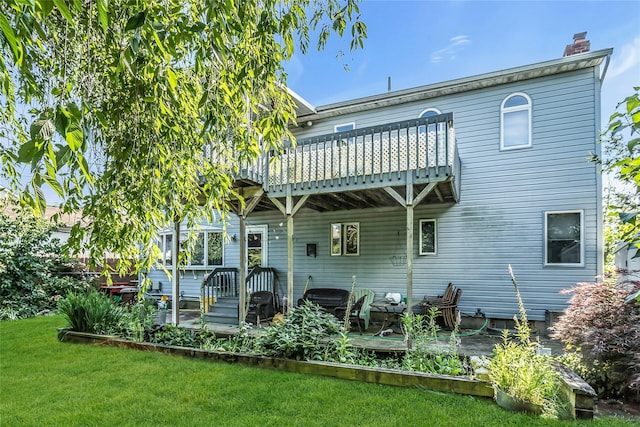 20 Wensley Rd, Plainview, NY 11803 - rear view of property featuring a chimney, a lawn, and a deck