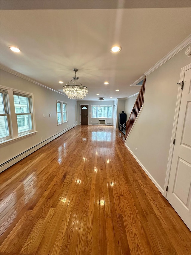 33-13 202nd St, Bayside, NY 11361 - unfurnished living room with a chandelier, crown molding, recessed lighting, wood finished floors, and stairway