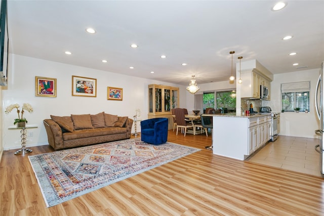 171 S Middle Neck Rd Unit 1F, Great Neck, NY 11021 - living area with recessed lighting, light wood-type flooring, and a chandelier