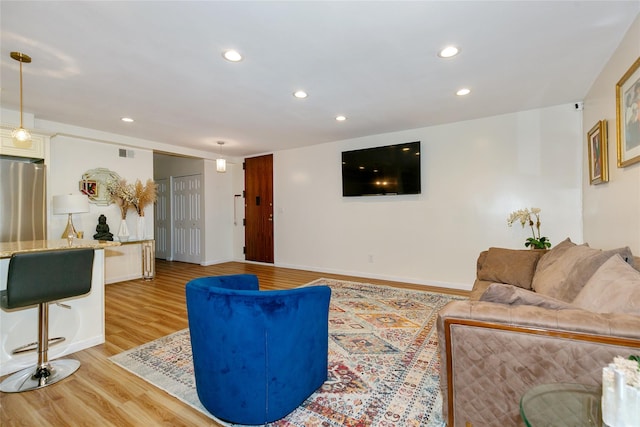 171 S Middle Neck Rd Unit 1F, Great Neck, NY 11021 - living room featuring light wood-style floors and recessed lighting