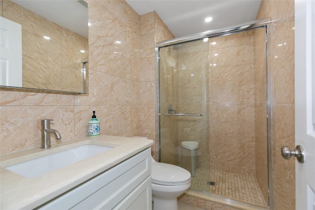 171 S Middle Neck Rd Unit 1F, Great Neck, NY 11021 - full bathroom with a shower stall, tile walls, and vanity