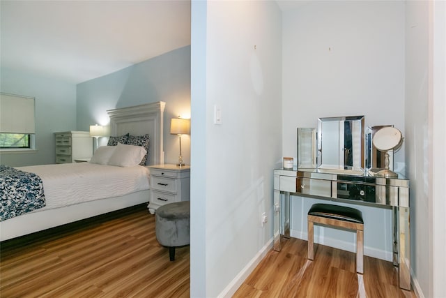 171 S Middle Neck Rd Unit 1F, Great Neck, NY 11021 - bedroom featuring wood finished floors and baseboards
