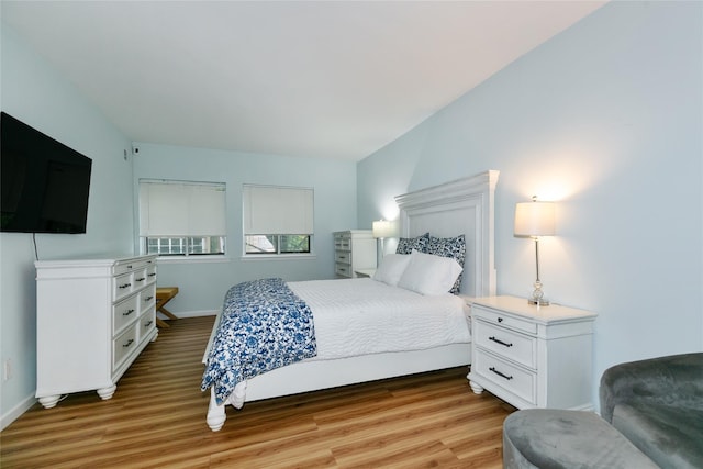 171 S Middle Neck Rd Unit 1F, Great Neck, NY 11021 - bedroom with light wood-style flooring and baseboards
