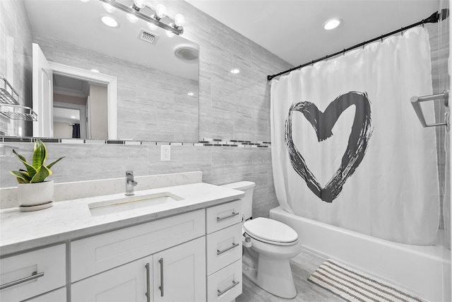 5 Vera Ave, Plainview, NY 11803 - bathroom with vanity, shower / bath combo, tile walls, and tasteful backsplash
