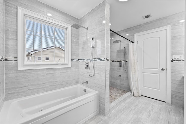 5 Vera Ave, Plainview, NY 11803 - bathroom featuring a tile shower and a tub