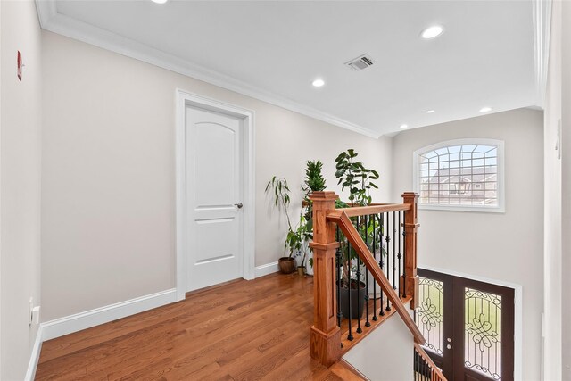 5 Vera Ave, Plainview, NY 11803 - hall with an upstairs landing, ornamental molding, recessed lighting, and light wood-style floors
