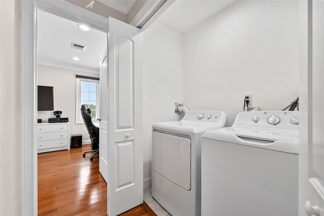 5 Vera Ave, Plainview, NY 11803 - washroom with washing machine and clothes dryer, crown molding, hardwood / wood-style flooring, a desk, and recessed lighting