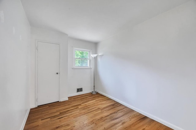 3 Washington Ave, Selden, NY 11784 - spare room featuring light wood finished floors and baseboards