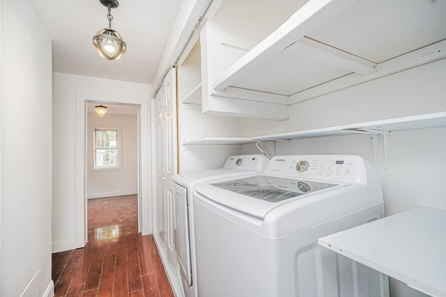 592 E 39th St, Brooklyn, NY 11203 - laundry room with dark wood-style flooring and separate washer and dryer