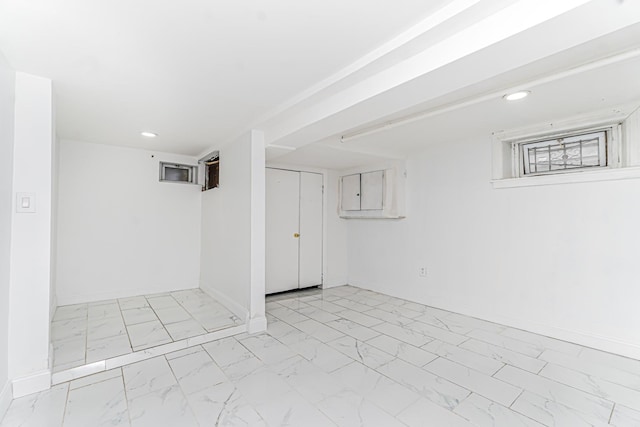 592 E 39th St, Brooklyn, NY 11203 - finished basement featuring light marble finish floors and recessed lighting