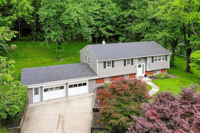 20 Honeymoon Ln, Poughkeepsie, NY 12603 - bi-level home with roof with shingles, driveway, a garage, and a front yard