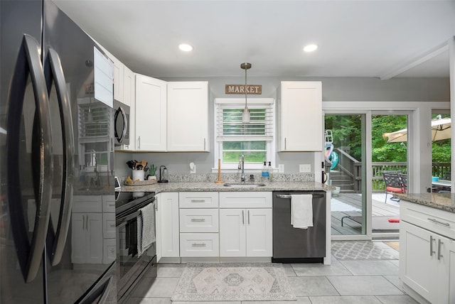20 Honeymoon Ln, Poughkeepsie, NY 12603 - kitchen with appliances with stainless steel finishes, white cabinetry, light stone counters, decorative light fixtures, and recessed lighting