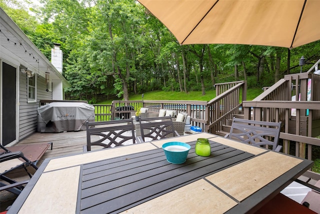 20 Honeymoon Ln, Poughkeepsie, NY 12603 - wooden terrace featuring outdoor dining area, grilling area, and view of scattered trees