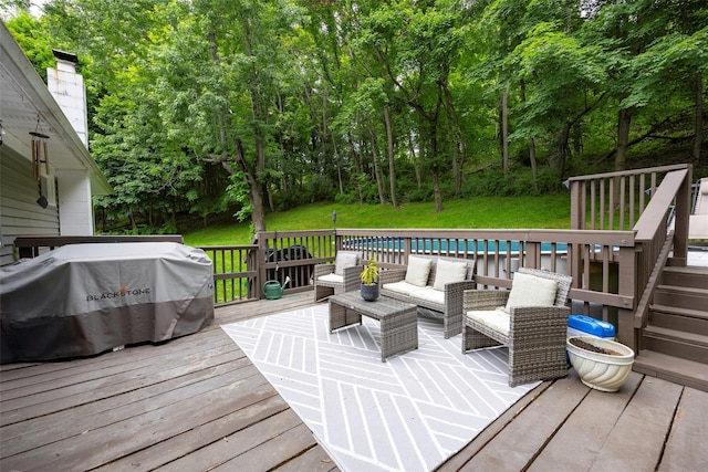 20 Honeymoon Ln, Poughkeepsie, NY 12603 - deck with an outdoor pool, an outdoor living space, area for grilling, and a yard