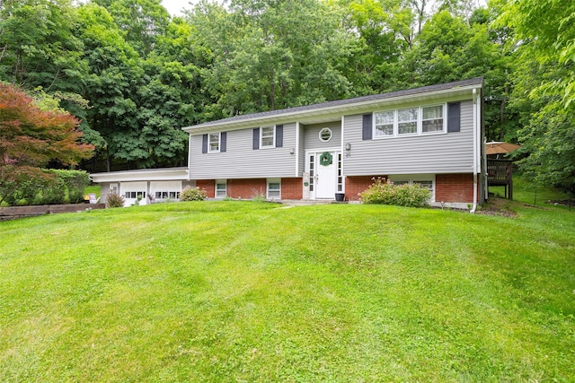 20 Honeymoon Ln, Poughkeepsie, NY 12603 - raised ranch with a front lawn and an attached garage