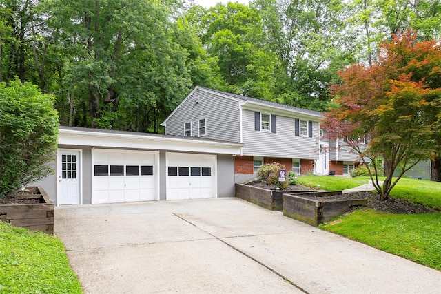 20 Honeymoon Ln, Poughkeepsie, NY 12603 - view of front facade with an attached garage and driveway