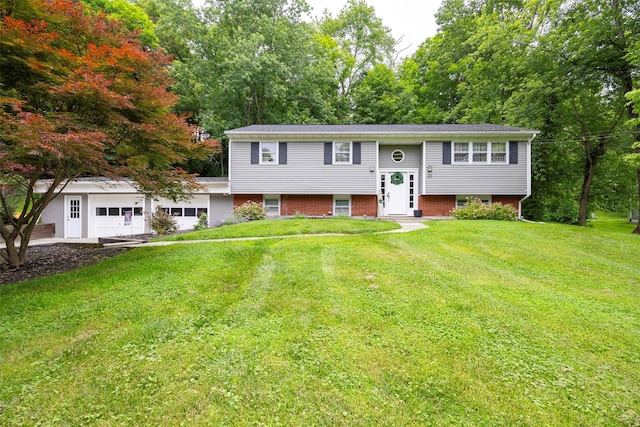 20 Honeymoon Ln, Poughkeepsie, NY 12603 - raised ranch featuring a front lawn and a garage