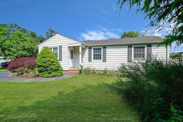 15 Roosevelt Blvd, East Patchogue, NY 11772 - single story home featuring a front lawn