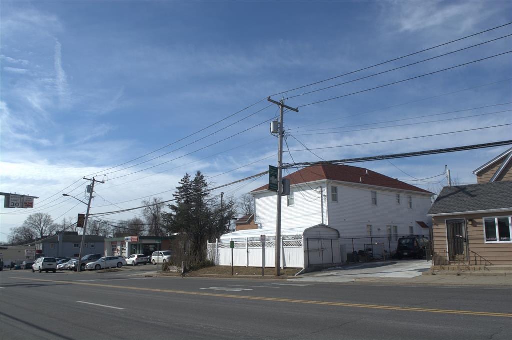 837 Willis Ave, Albertson, NY 11507 - view of asphalt road with curbs, sidewalks, and street lights