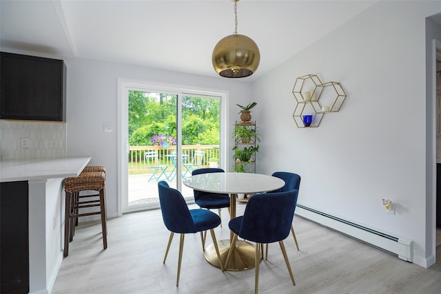 47 Clay Hill Rd, Tivoli, NY 12583 - dining room featuring a baseboard heating unit and light wood finished floors
