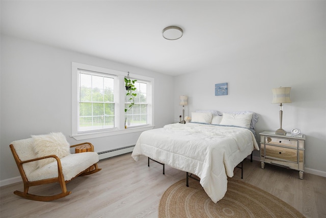 47 Clay Hill Rd, Tivoli, NY 12583 - bedroom with a baseboard radiator and light wood finished floors