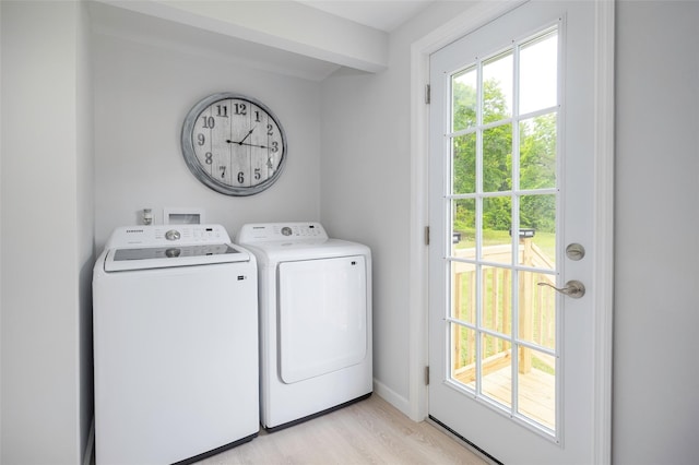 47 Clay Hill Rd, Tivoli, NY 12583 - washroom featuring washing machine and dryer and light wood-style flooring