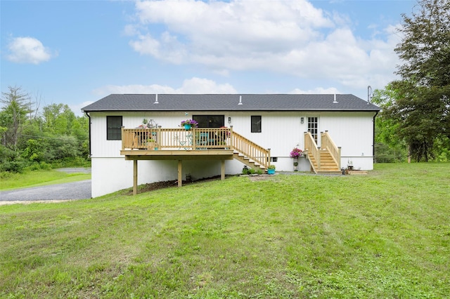 47 Clay Hill Rd, Tivoli, NY 12583 - rear view of house featuring a wooden deck, a lawn, and stairs