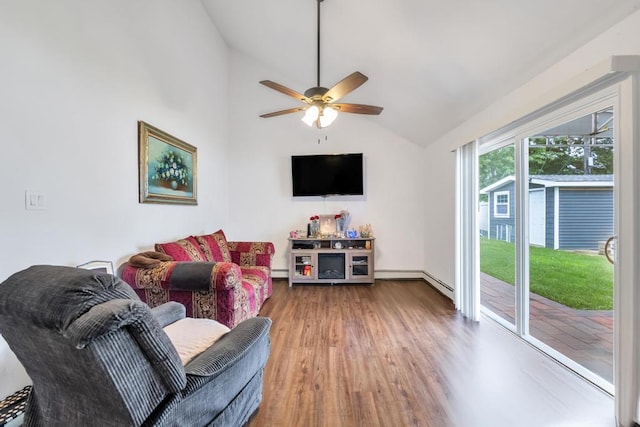 31 Willowood, Wantagh, NY 11793 - living area featuring lofted ceiling, wood finished floors, a ceiling fan, baseboard heating, and a baseboard radiator