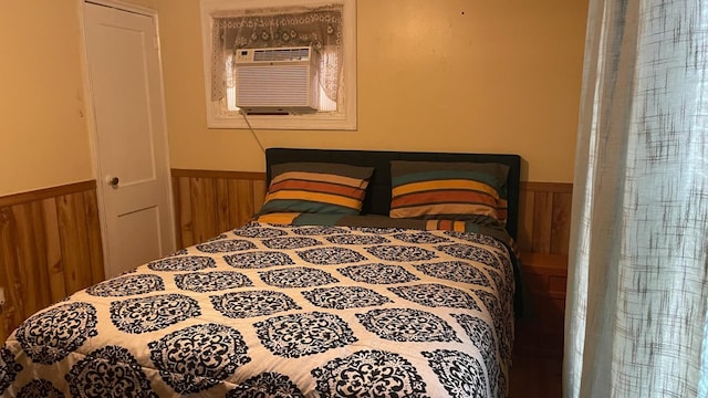 31 N Wayne Ave, West Haverstraw, NY 10993 - bedroom featuring wainscoting, wood walls, and a wall unit AC