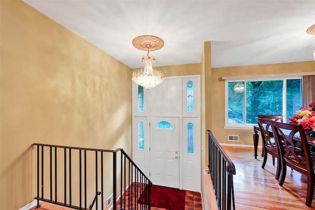 5 Medford Pl, Nanuet, NY 10954 - foyer entrance with a chandelier and wood finished floors