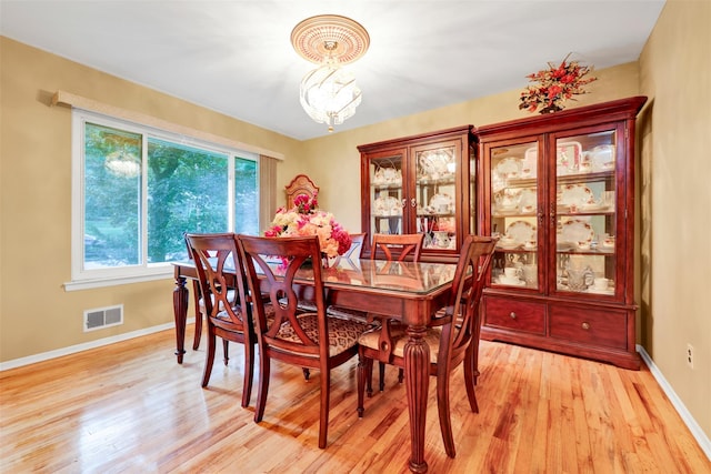 5 Medford Pl, Nanuet, NY 10954 - dining area featuring light wood-style flooring and a chandelier