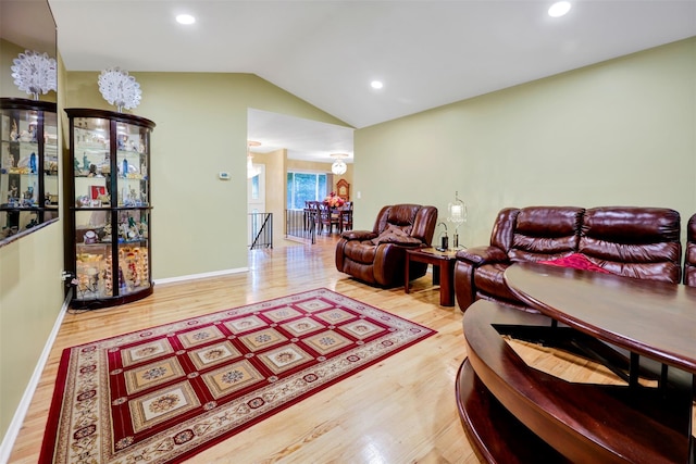 5 Medford Pl, Nanuet, NY 10954 - living room featuring wood finished floors, lofted ceiling, and recessed lighting