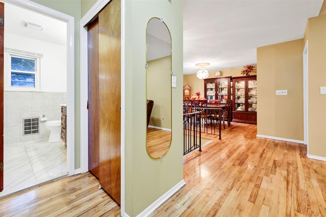 5 Medford Pl, Nanuet, NY 10954 - hall with hardwood / wood-style floors and a chandelier