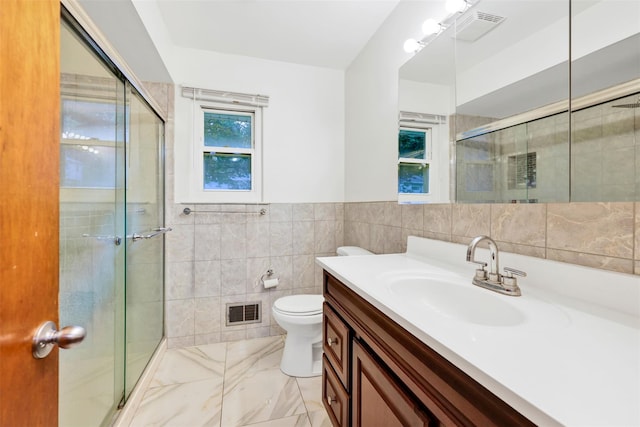 5 Medford Pl, Nanuet, NY 10954 - full bathroom featuring tile walls, vanity, a stall shower, and marble finish floors