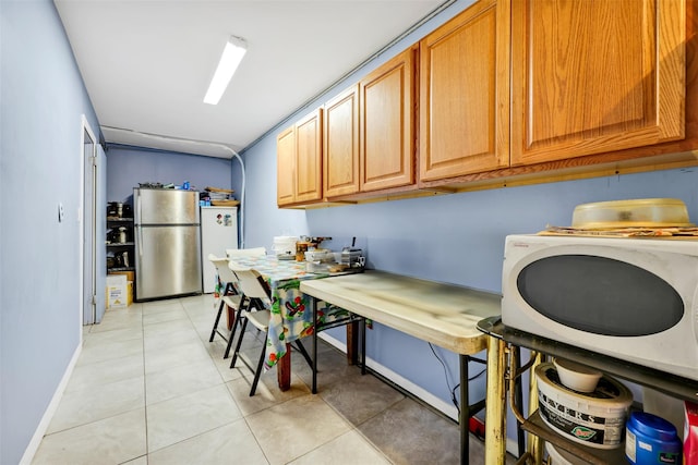 5 Medford Pl, Nanuet, NY 10954 - laundry area featuring baseboards and light tile patterned floors