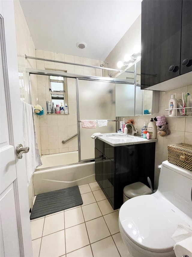 252-23 63rd Ave Unit 1081, Little Neck, NY 11362 - bathroom with tile patterned flooring, enclosed tub / shower combo, vanity, tile walls, and tasteful backsplash