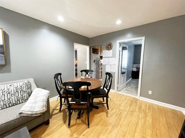 252-23 63rd Ave Unit 1081, Little Neck, NY 11362 - dining room featuring light wood-style floors and recessed lighting