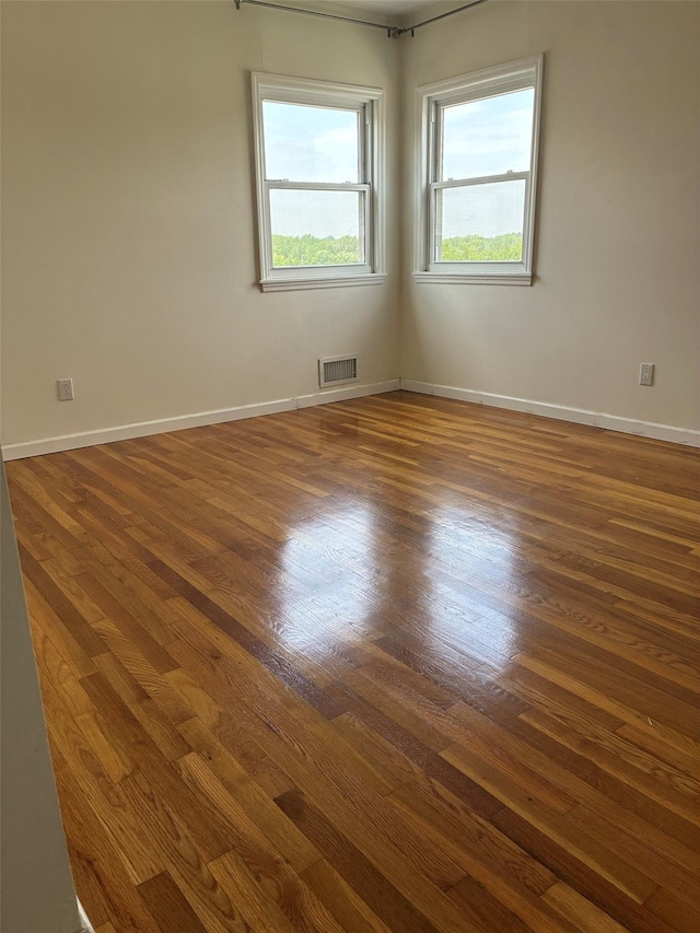 141-31 25th Rd, Flushing, NY 11354 - spare room with dark wood-type flooring