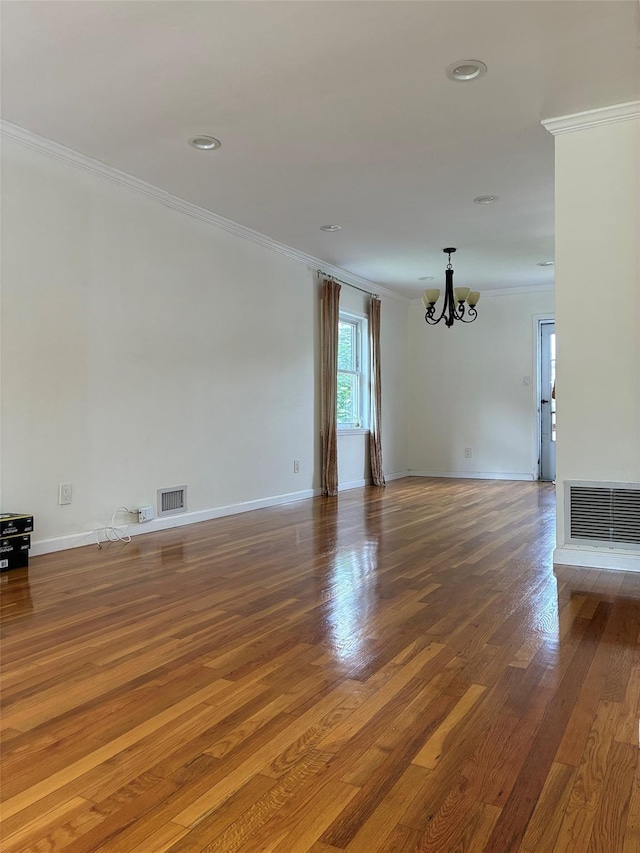 141-31 25th Rd, Flushing, NY 11354 - empty room with a chandelier, ornamental molding, wood finished floors, and recessed lighting
