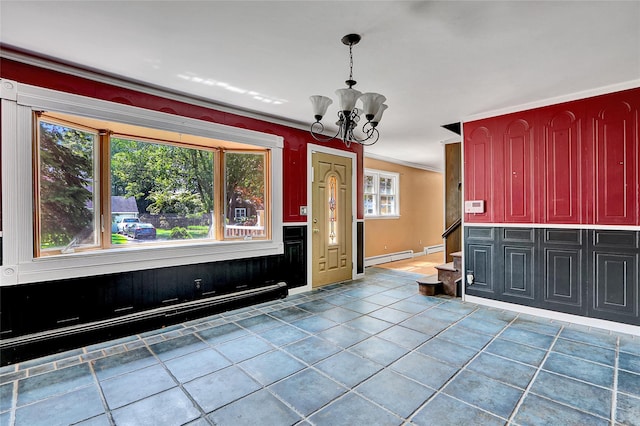 89 Circuit Rd, Bellport, NY 11713 - foyer with a chandelier, stairway, crown molding, and baseboard heating