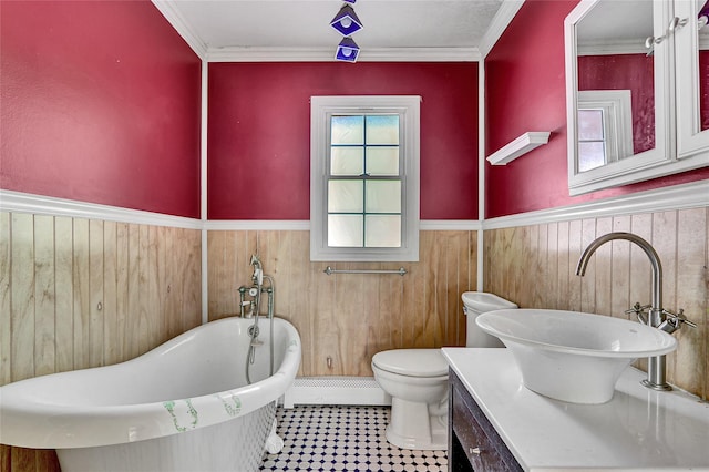 89 Circuit Rd, Bellport, NY 11713 - full bathroom featuring a freestanding tub, wainscoting, a baseboard heating unit, vanity, and wood walls