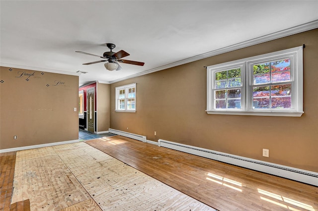 89 Circuit Rd, Bellport, NY 11713 - empty room with a baseboard radiator, ceiling fan, crown molding, and wood finished floors