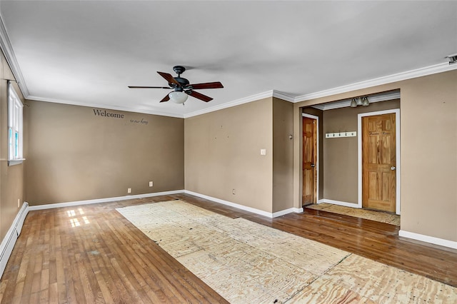 89 Circuit Rd, Bellport, NY 11713 - empty room featuring a baseboard heating unit, hardwood / wood-style flooring, a ceiling fan, and crown molding