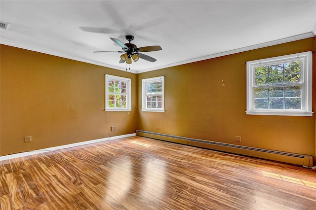 89 Circuit Rd, Bellport, NY 11713 - spare room with a baseboard heating unit, ornamental molding, hardwood / wood-style flooring, and a ceiling fan