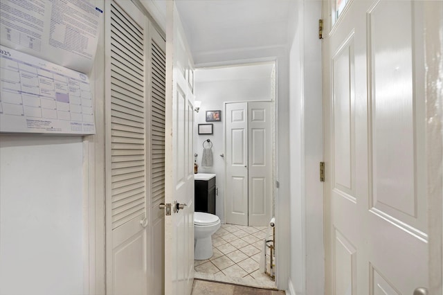 3046 Coddington Ave, Bronx, NY 10461 - bathroom with a closet and tile patterned floors