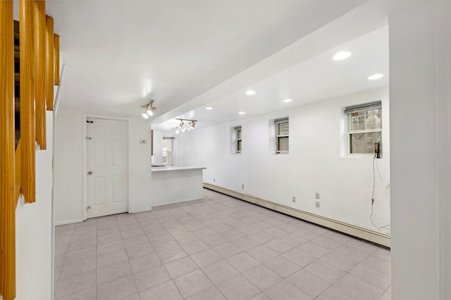 3046 Coddington Ave, Bronx, NY 10461 - empty room with a baseboard heating unit and recessed lighting