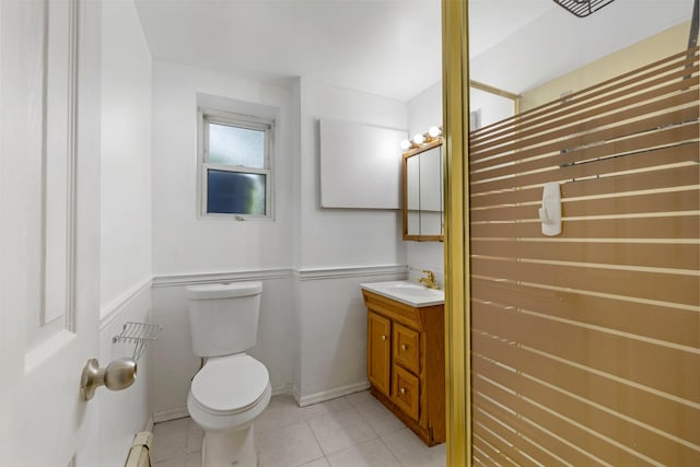 3046 Coddington Ave, Bronx, NY 10461 - bathroom featuring vanity, a baseboard radiator, and tile patterned floors