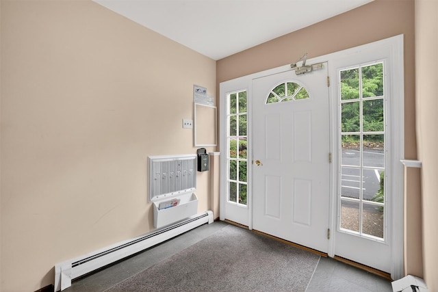 13 Scenic Unit J, Croton-On-Hudson, NY 10520 - foyer featuring a baseboard radiator and plenty of natural light