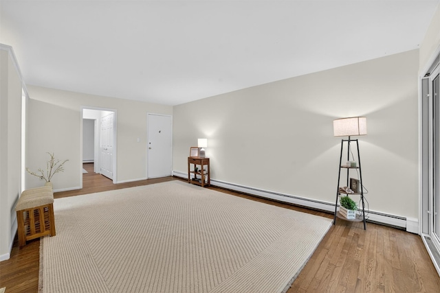 13 Scenic Unit J, Croton-On-Hudson, NY 10520 - unfurnished room with wood finished floors and baseboard heating