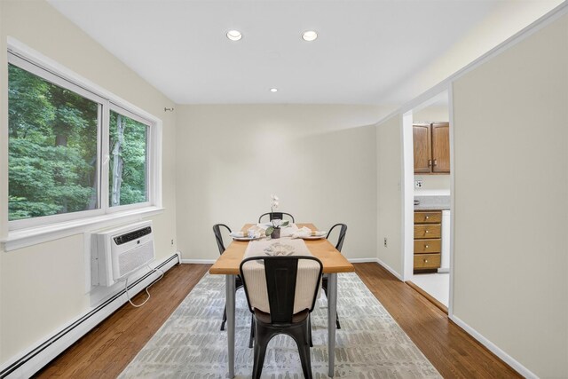 13 Scenic Unit J, Croton-On-Hudson, NY 10520 - dining room featuring a baseboard heating unit, recessed lighting, dark wood-type flooring, and a wall mounted AC
